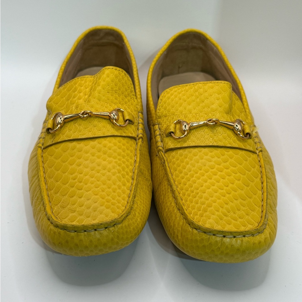 Cole Haan Yellow Flats with Gold Detailing and Textured Design